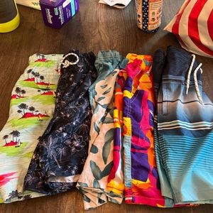 5 pairs of Men’s swimsuit trunks size small